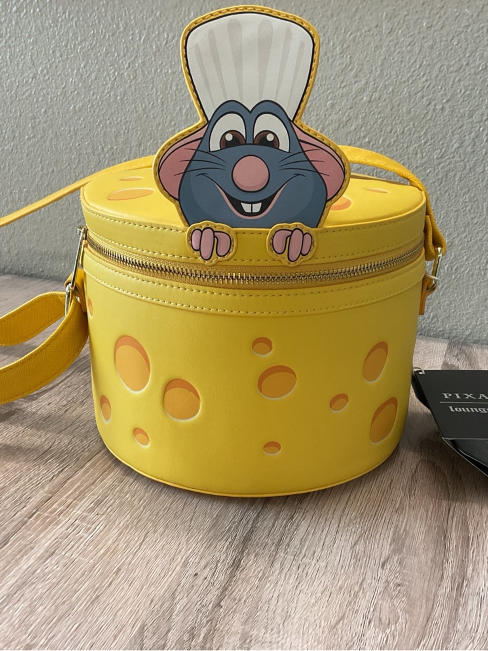 Loungefly Disney Ratatouille Remy Cheese Wheel Strawberry Scented Crossbody Bag